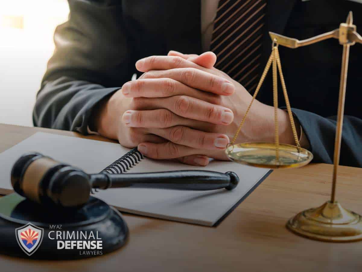 Attorney discussing Arizona’s DUI laws with legal documents and gavel